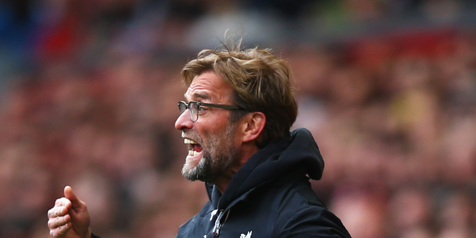 Who should start up front for Liverpool against Dortmund?