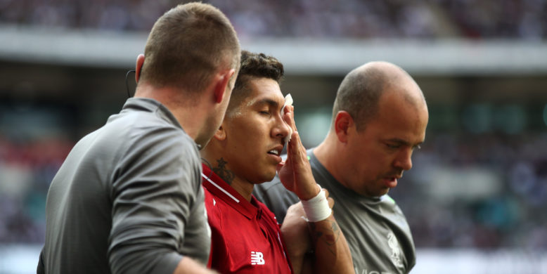Roberto Firmino arrives with Liverpool squad at Anfield