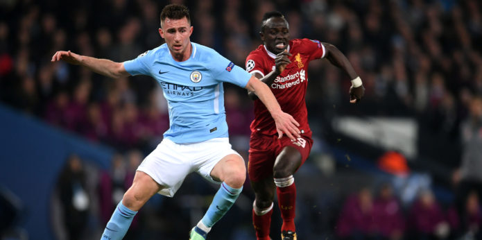 Man City defender Laporte stretchered off – is this a title boost for Liverpool?