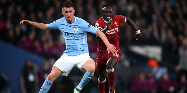 Man City defender Laporte stretchered off – is this a title boost for Liverpool?