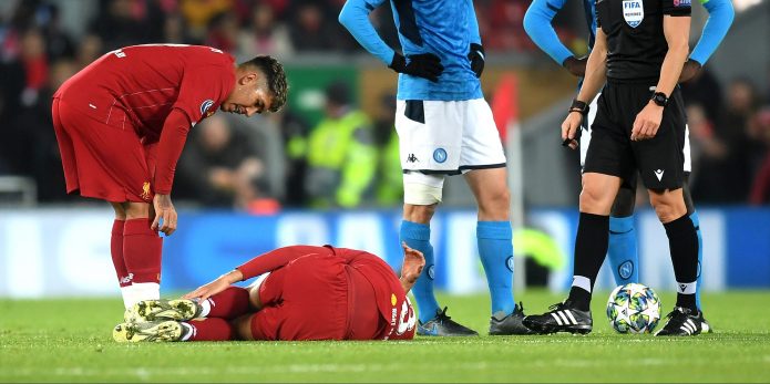 Fabinho leaves Anfield in a protective walking boot