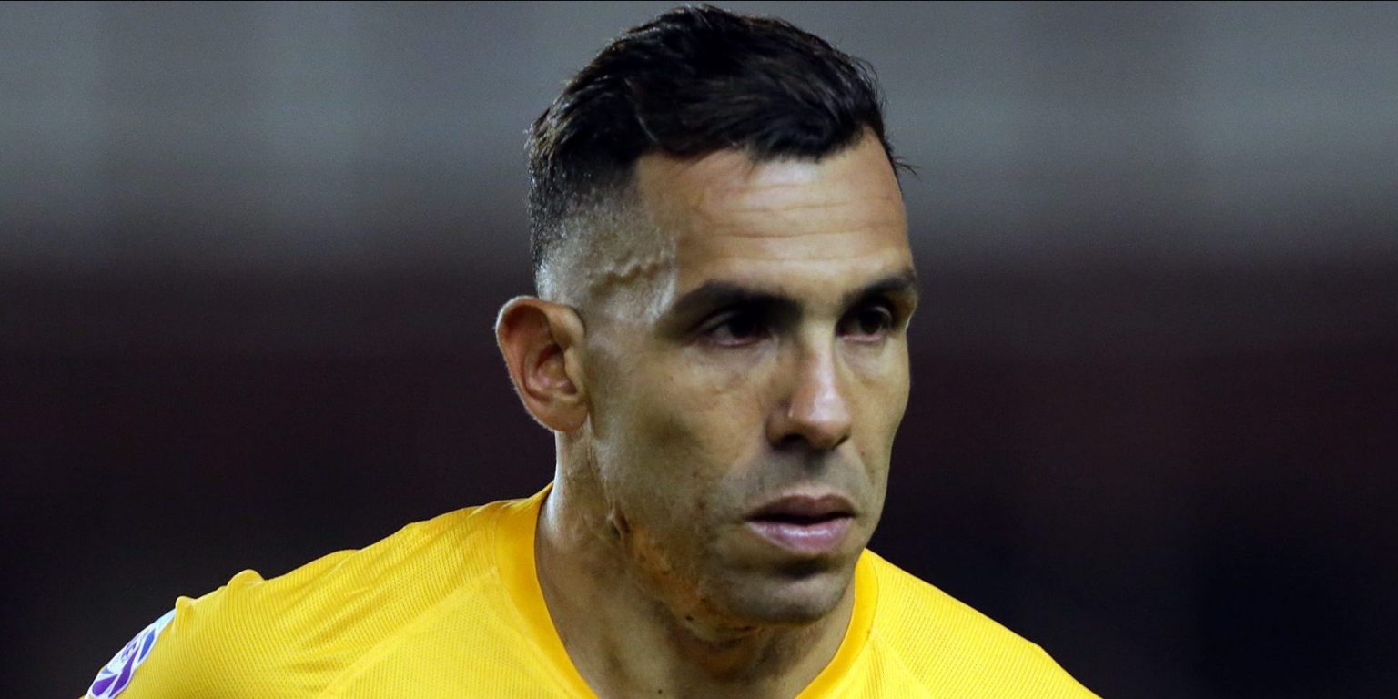 Liverpool fans mock rumours linking Tevez with return to Man United