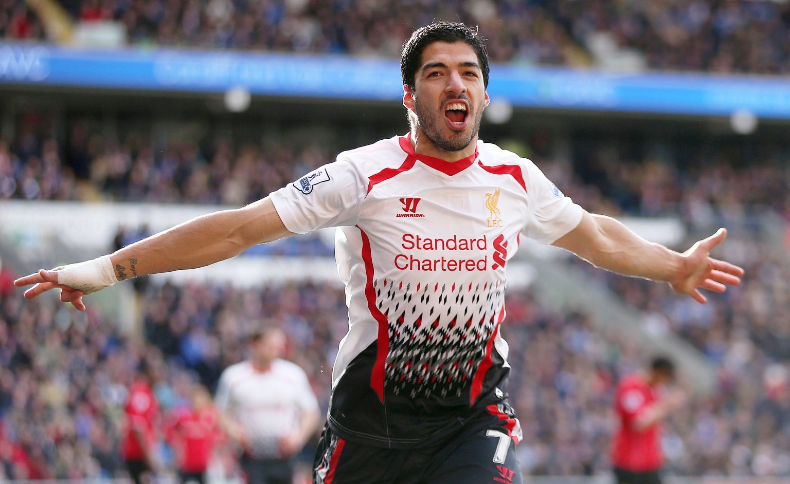 Former Liverpool striker Luis Suarez in action for Liverpool