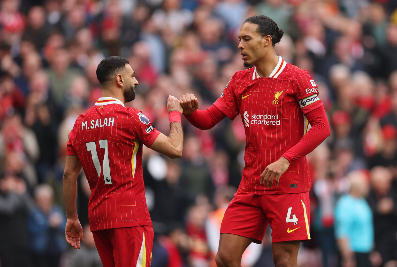 Virgil Van Dijk and Mo Salah contracts