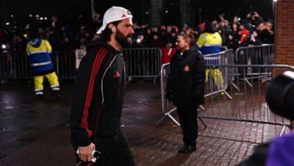 Alisson Becker contract: Alisson Becker arriving at a venue wearing gear.