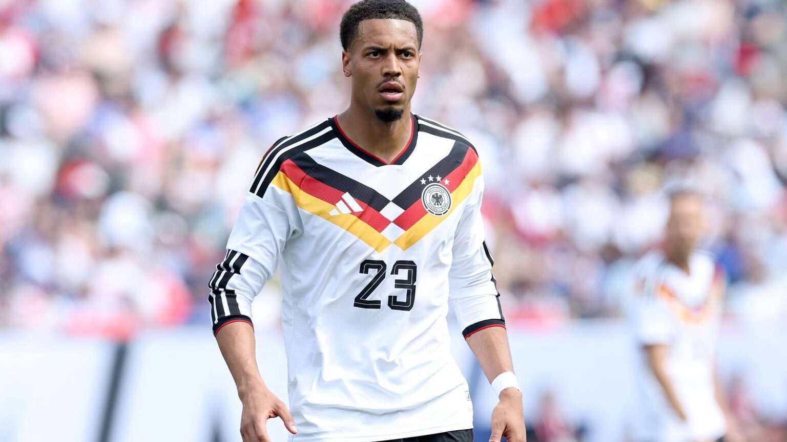 Felix Nmecha wearing Germany's number 23 shirt during an international match