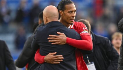 Liverpool Man City compensation: Virgil van Dijk embracing manager Arne Slot during a match