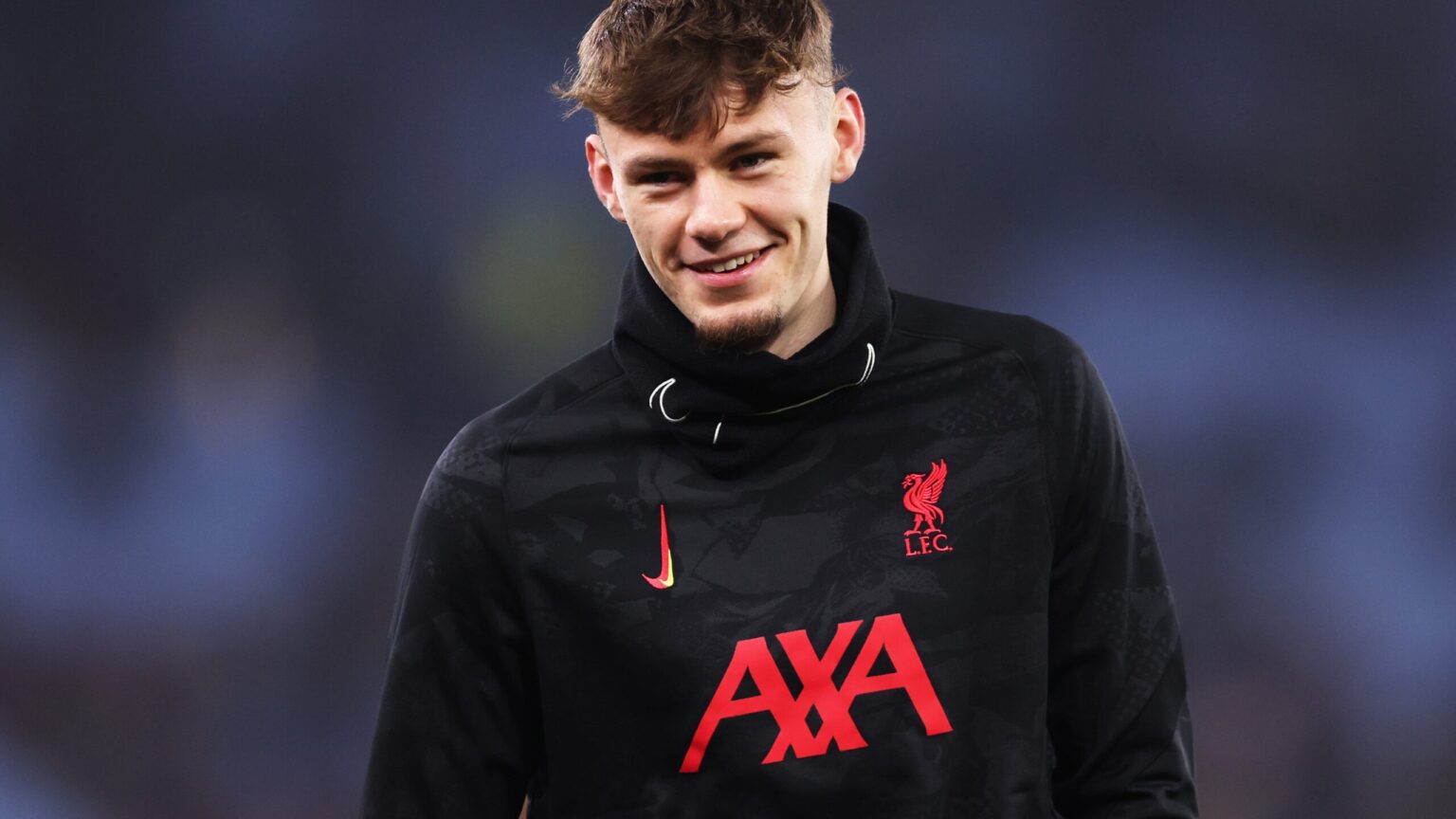 Conor Bradley wearing Liverpool kit