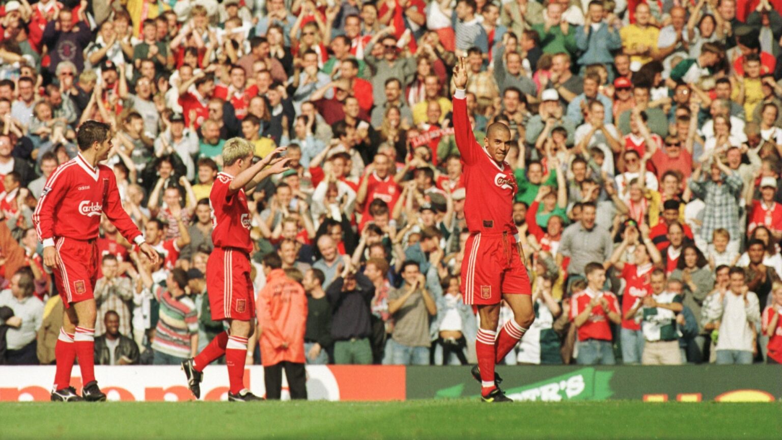 Man City expulsion: Stan Collymore celebrating in a Liverpool match photo from his playing career