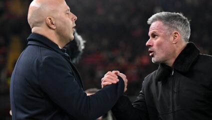 Jamie Carragher Manchester City: Jamie Carragher shaking hands with Arne Slot during a broadcast appearance.